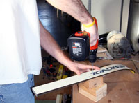 screwing ski to wood block
